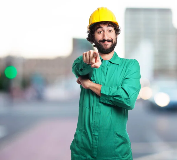 Happy worker man pointing front