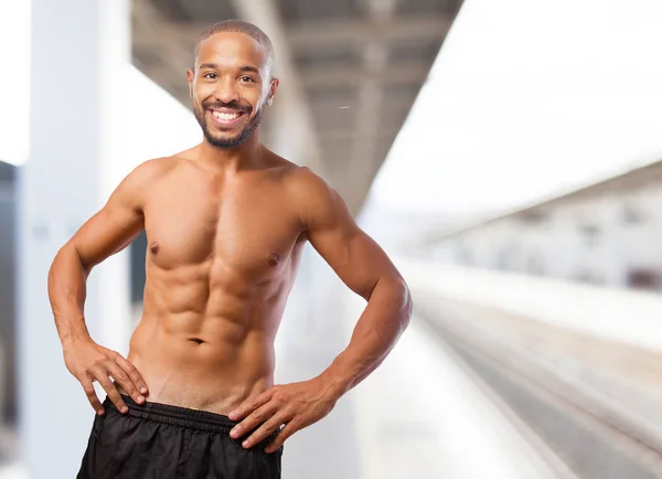 Happy black man in strong pose
