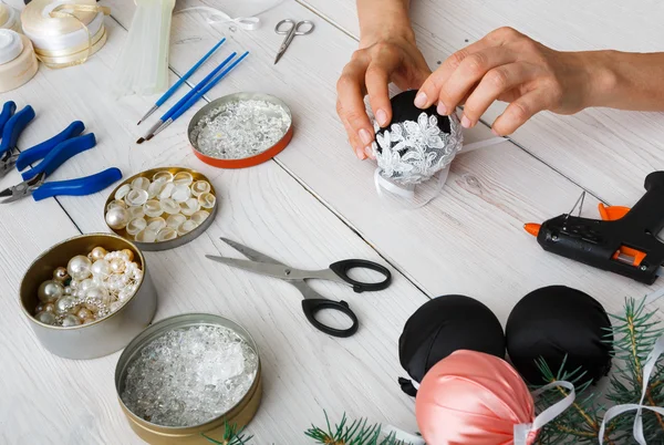 Creative diy craft hobby. Handmade christmas decoration, balls and garland