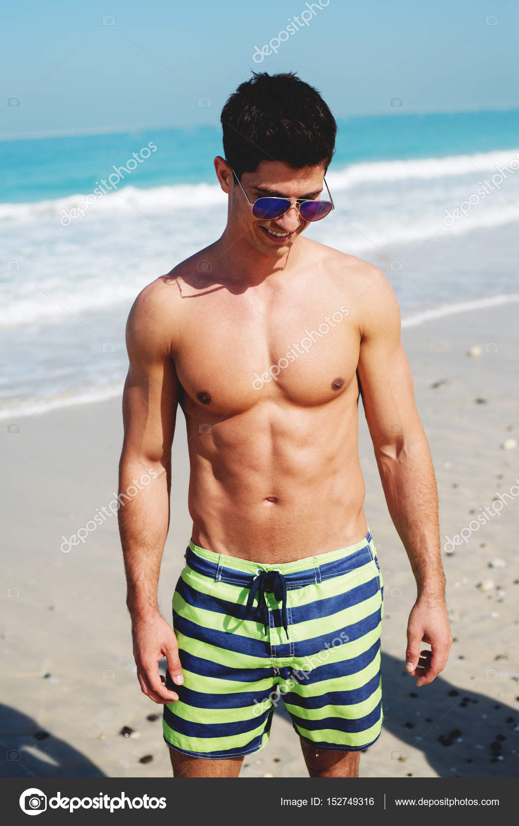 Shirtless Man On Beach Stock Photo By Dusanpetkovic 152749316