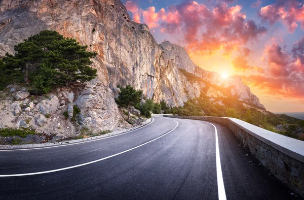 Asphalt road. Colorful landscape with beautiful winding mountain