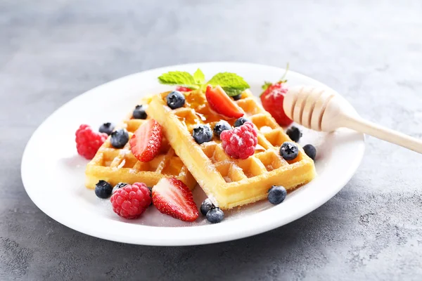 Homemade waffles with berries