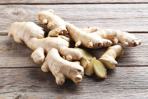 Ginger root on wooden table