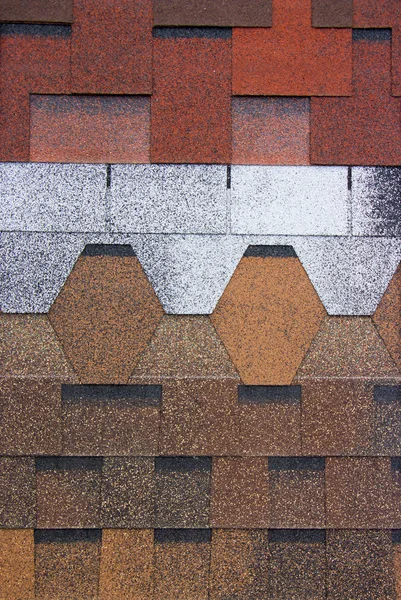 Concrete roofing tiles in sample colors and patterns