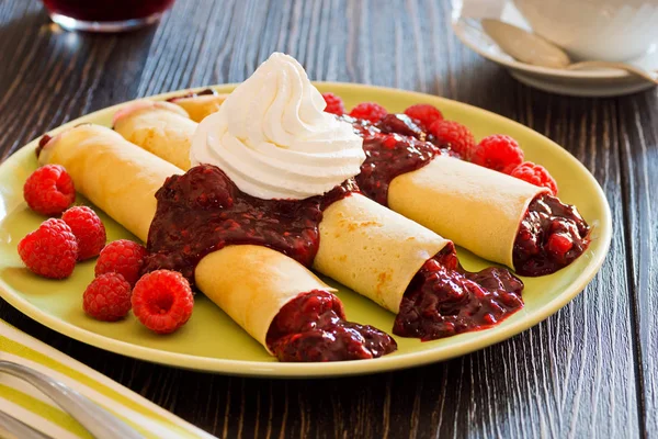 Dessert Crepes with Berry Sauce, Raspberries, and Whipped Cream