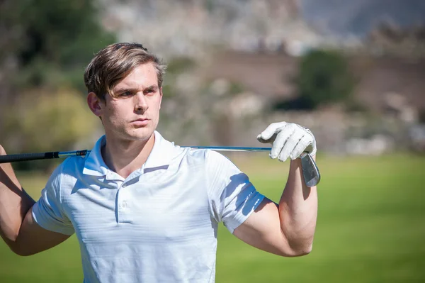 Close up view of a male golfer