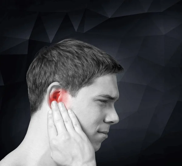 Man having ear pain