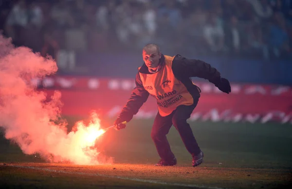 Steward cleaning up the flares from the field.
