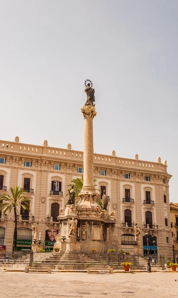 The obelisk-like Colonna dell Immacolata Virgin in the square San Domenico in Palermo, Sicily