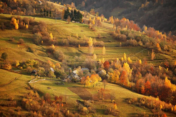 Fall in mountain village. October scene