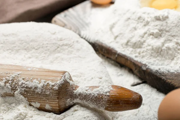 Rolling pin with flour close up. Copy space