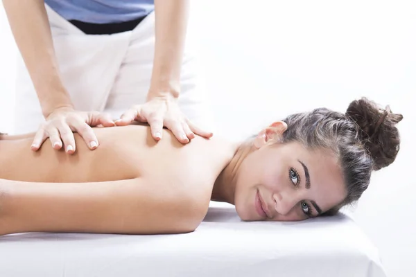 Woman in spa centar enjoying the massage