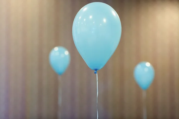 Blue balloons in restaurant