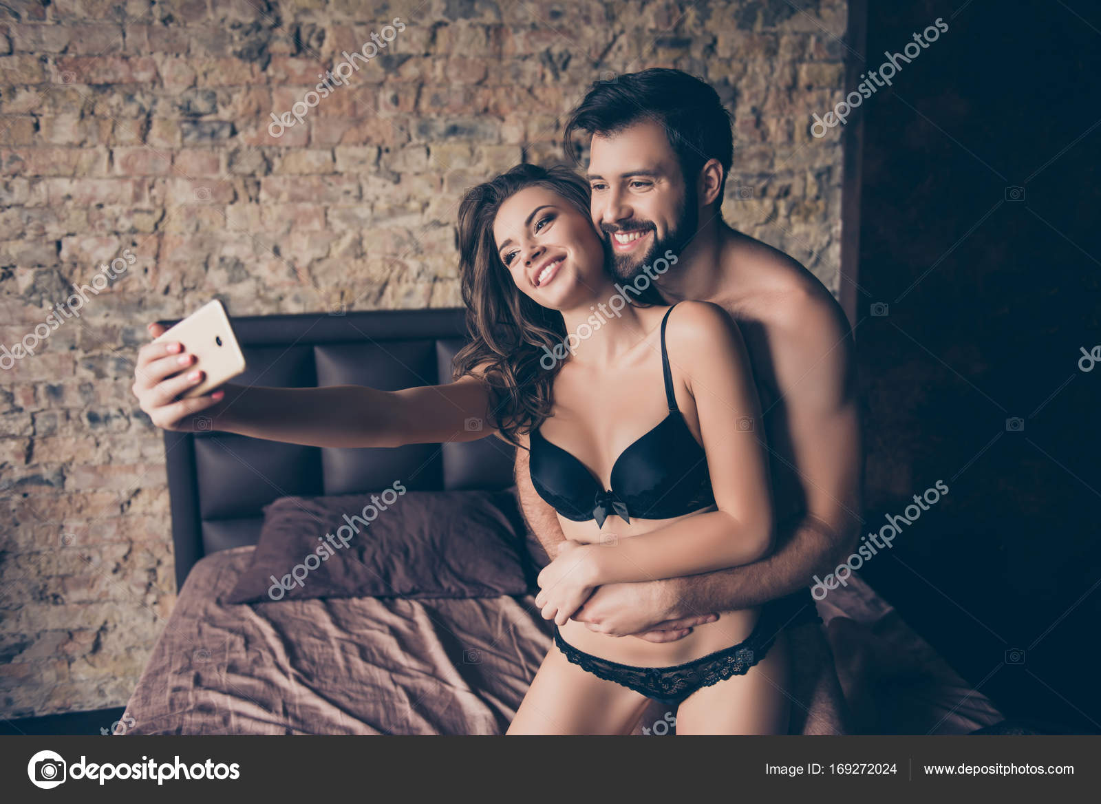 Beautiful Half Naked Brunet Couple Is Embracing In Bed Lady Tak Stock Photo Deagreez 128772 Hot Sex Picture photo
