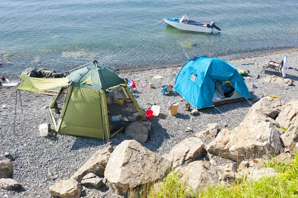 Wild tourist camping on desert beach