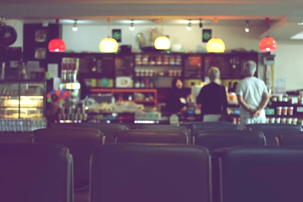 Defocus with coffee and bakery shop blurred background, vintage