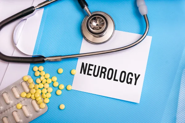 Neurology word written on medical blue folder with patient files