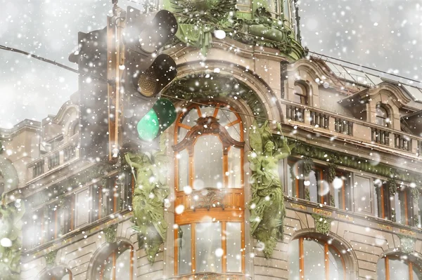 Saint Petersburg at winter. Singer House (House of Books)  on Nevsky Prospect in St. Petersburg at snowstorm