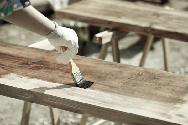 Painting wood with wood protection paint