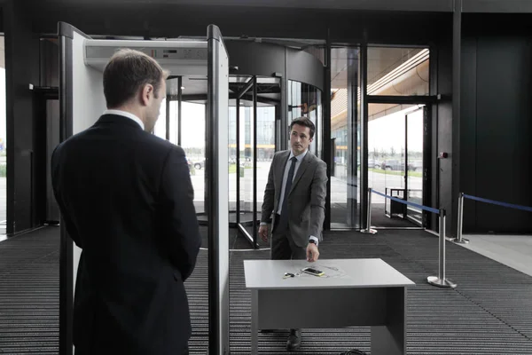 Man at airport security gates