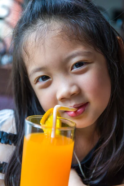 Kid Drinking Orange Juice