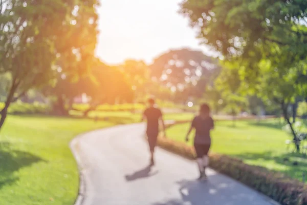 Blurry focus scene of people in public park