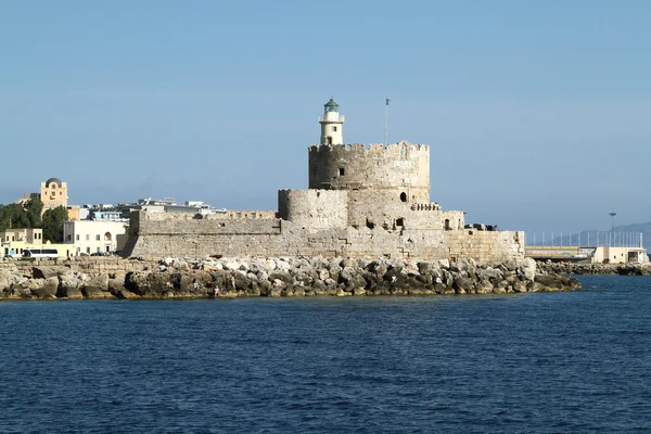 Stone Fort of St. Nicholas with the lighthouse in the harbor of