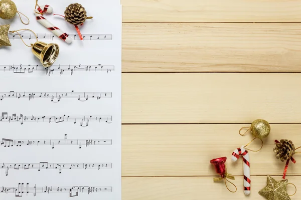 Music sheet note paper and christmas decoration