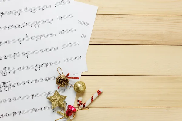 Music sheet note paper and christmas decoration