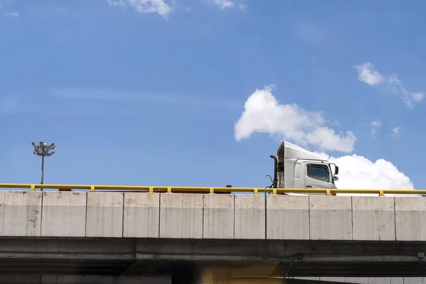The transportation  truck on the bridge after shipping at cargo.
