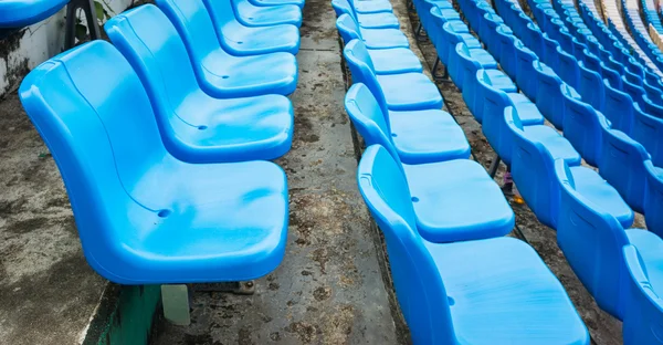 A group of empty seat or chair in stadium , theater or conxert