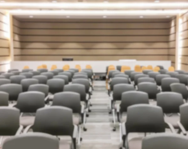 Motion blur of view of empty seminar after finish meeting and audience go out in a seminar room background