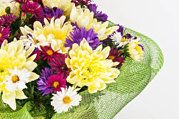 Bouquet with chrysanthemums and asters on a white background clo