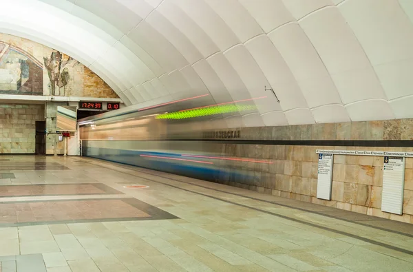 The train is leaving at speed in the tunnel at the metro station Timiryazevskaya in Moscow