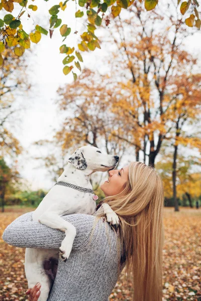 Woman with a dog in park