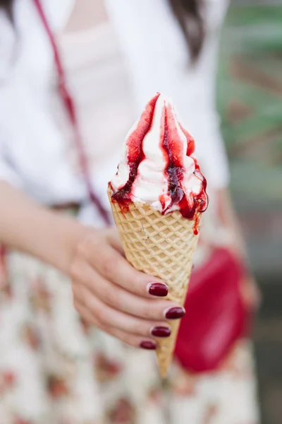 Woman holding ice cream