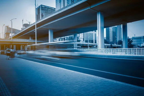 Traffic under the overpass in China.