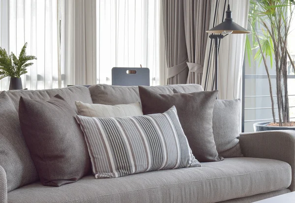 Classic style of pillows and sofa in grey tone color