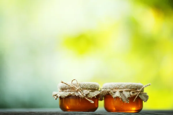 Jars of honey in eco-style