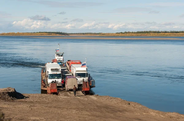 River Aldan. Yakutia, Russia  on September 14, 2015. A crossing on the ferry.