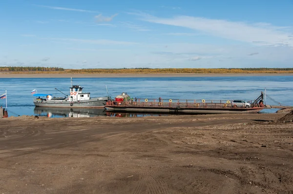 River Aldan. Yakutia, Russia  on September 14, 2015. A crossing on the ferry.