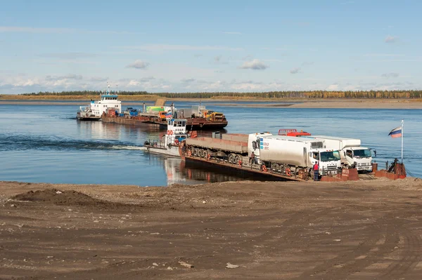 River Aldan. Yakutia, Russia  on September 14, 2015. A crossing on the ferry.