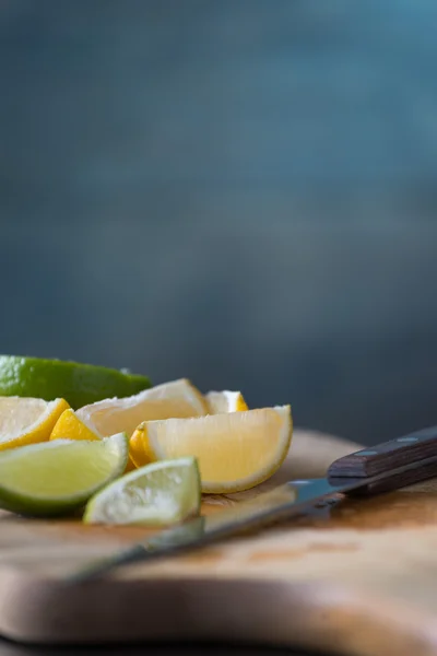 Lemons cut on a cutting board