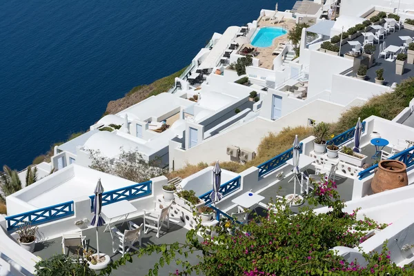 View of Imerovigli village with typical white Greek houses on Santorini island, Greece.