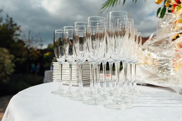 Wedding glasses filled with champagne at banquet