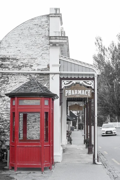 Arrowtown, New Zealand - February 2016: Old classic buildings and shops on Buckingham Street in the historic town of Arrowtown