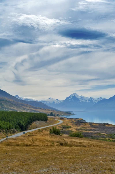 State Highway 80 or Mount Cook Road situated beside scenic Lake Pukaki leading to New Zealand\'s highest mountain Aoraki / Mount Cook.