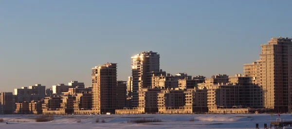 Modern skyscapers in golden winter sunset