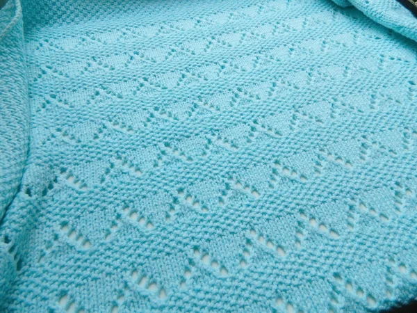 Turquoise knitted blanket