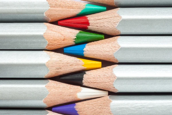 Cohesive colored pencils. Sharpened colored pencils. A stack of colored pencils. Ready to paint.
